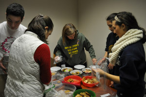 Filling Tins for Operation Yellow Ribbon Cookie Drive
